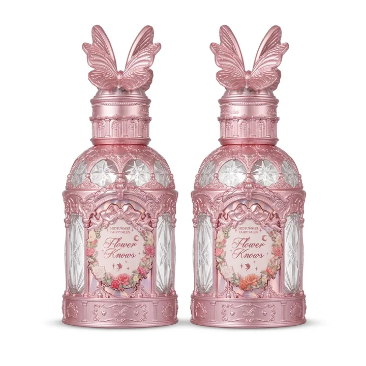 The same Flower Knows bottles on pure white after Foca AI — intricate pink metalwork and butterfly caps preserved