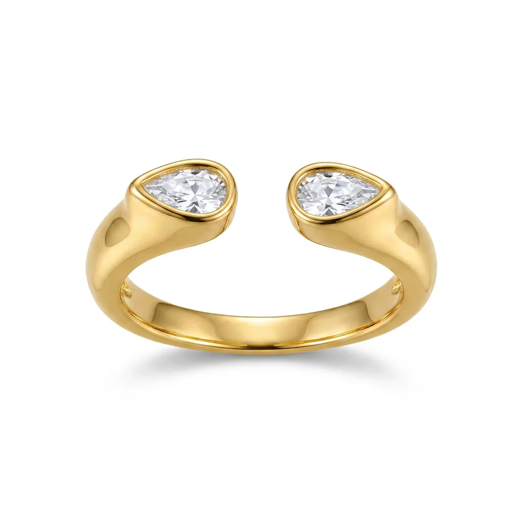 The same gold open ring on pure white after Foca AI — true gold tone, both bezel-set pear stones crisp, clean contact shadow