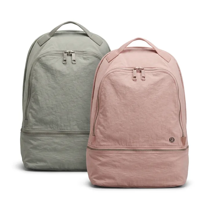 The same Lululemon backpack on pure white after Foca AI: full shape, true black, zippers and logo intact