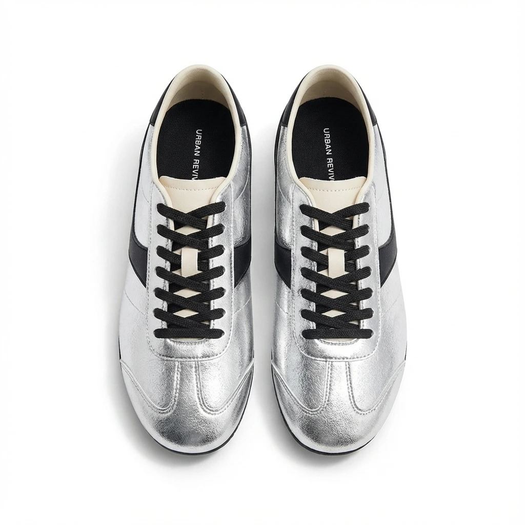 Silver sneakers on white background
