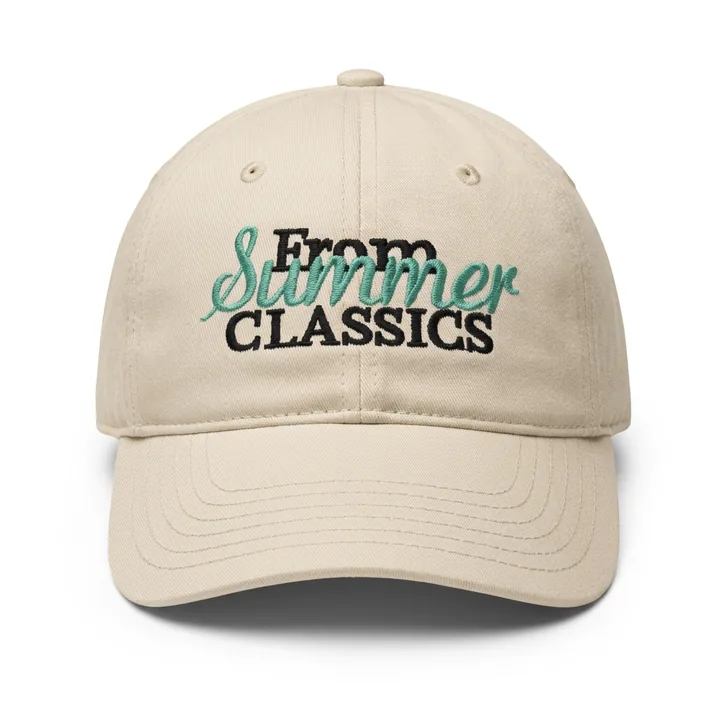 The same cream cap on pure white after Foca AI — the From Summer Classics embroidery stays crisp and legible